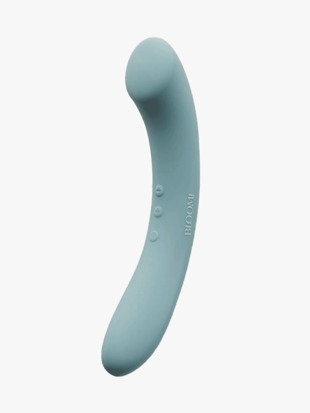 A teal Bloomi Indulge Double-Sided Vibe vibrator on a light gray background