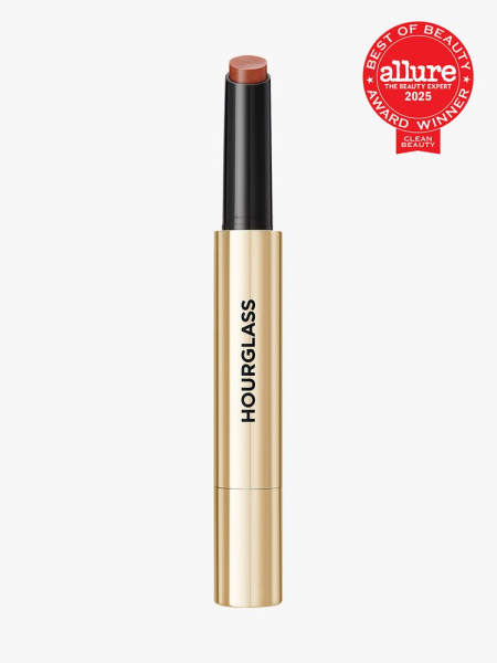 Hourglass Phantom Volumizing Glossy Balm in branded gold and black twist up applicator on light gray background with red Allure Best of Beauty seal in the top right corner