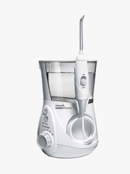 Waterpik White Aquarius Water Flosser silver and white water flosser on light gray background